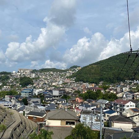 Route - Cafe And Petit Hostel Nagasaki Bagian luar foto